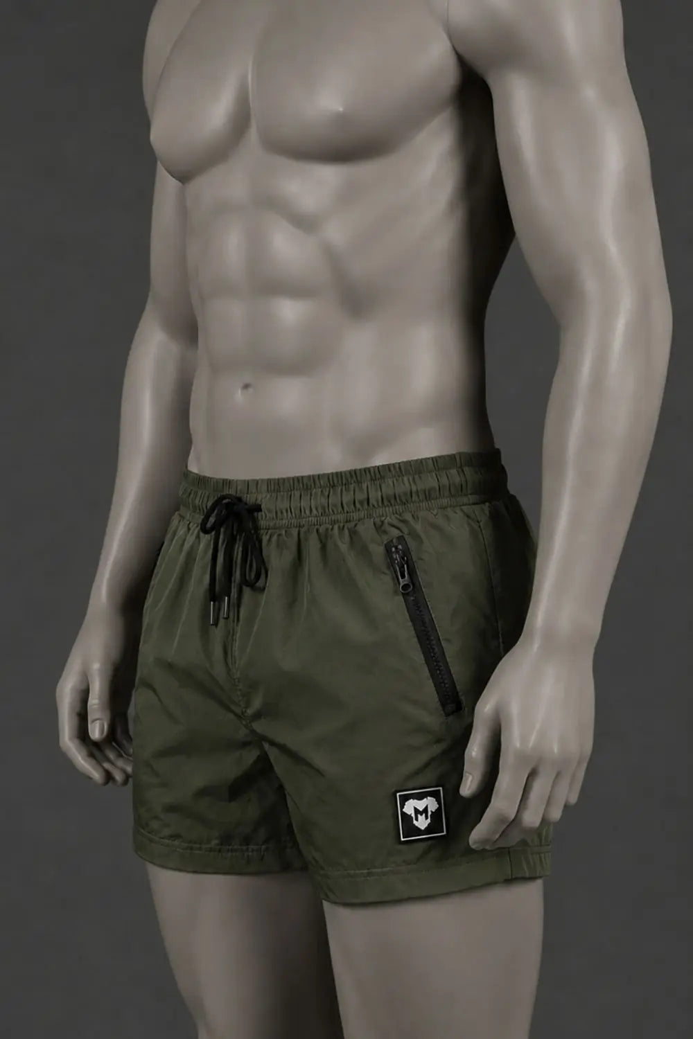 Short Jedd Synther Soft avec poches zippées. Vert kaki
