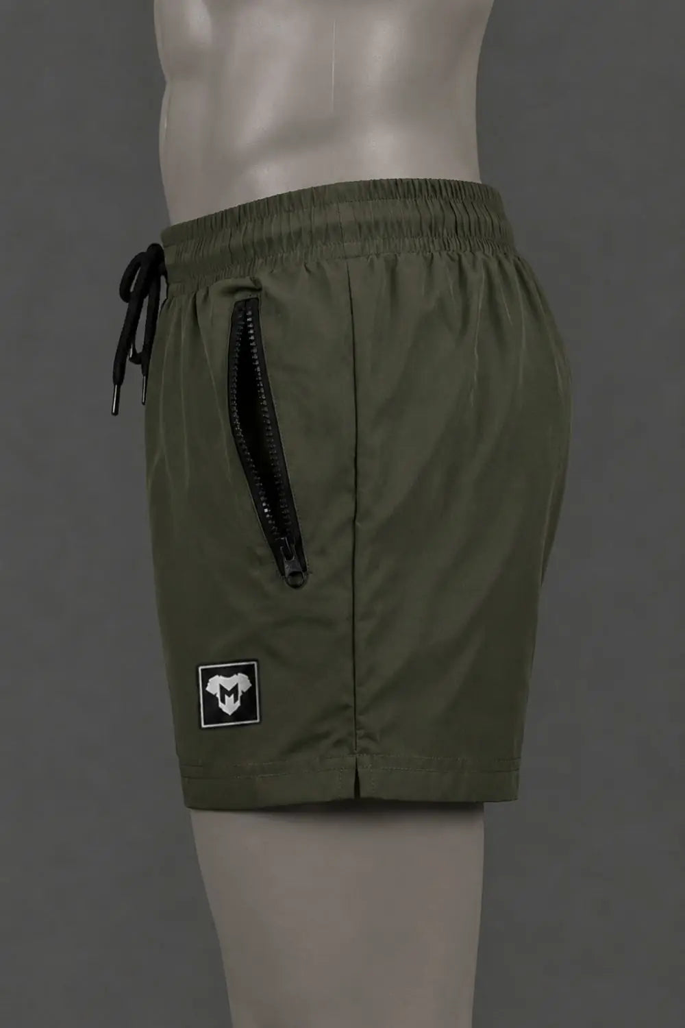 Short Jedd Synther Soft avec poches zippées. Vert kaki