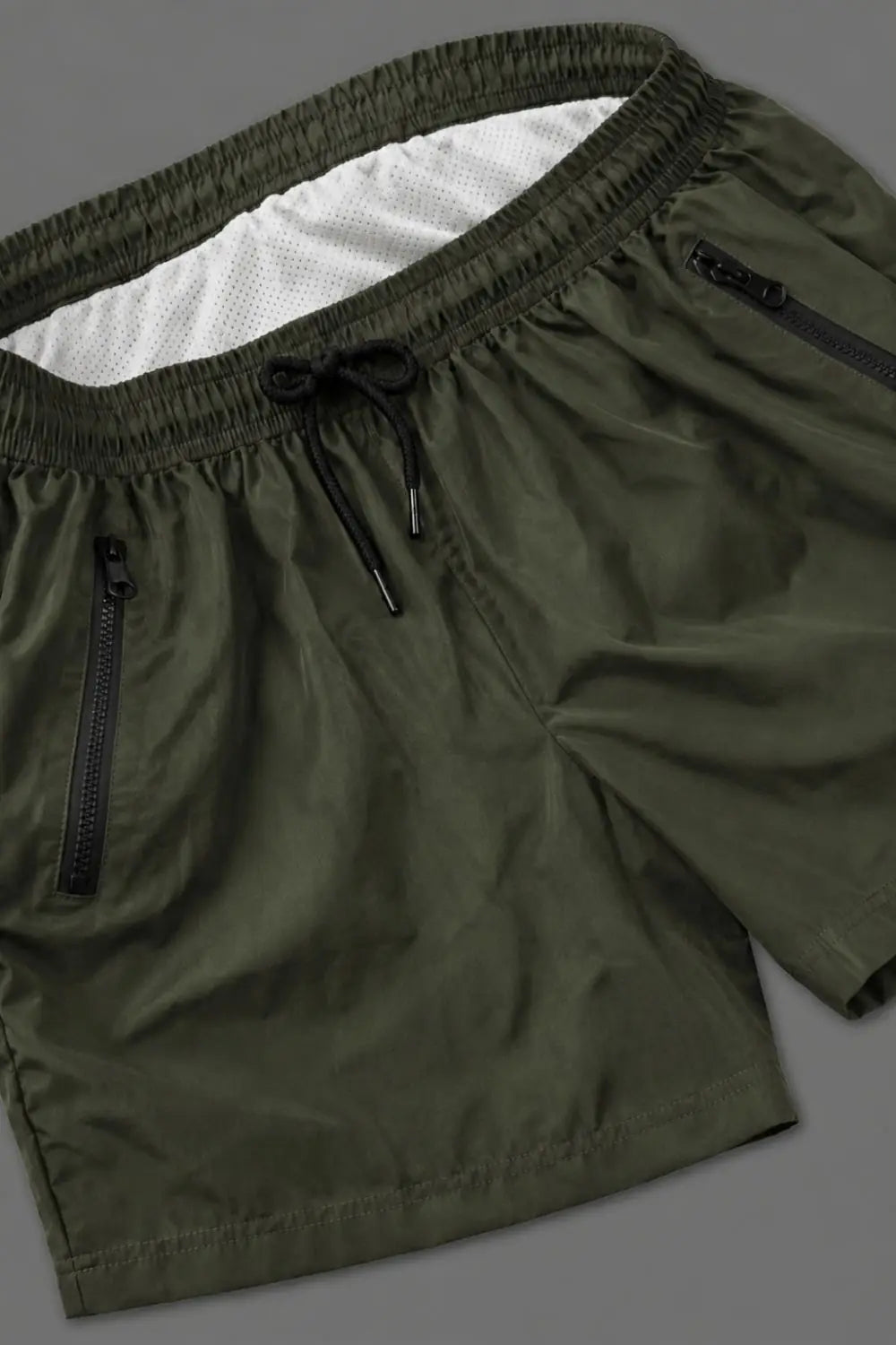 Short Jedd Synther Soft avec poches zippées. Vert kaki