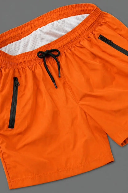 Short Jedd Synther Soft avec poches zippées. Orange