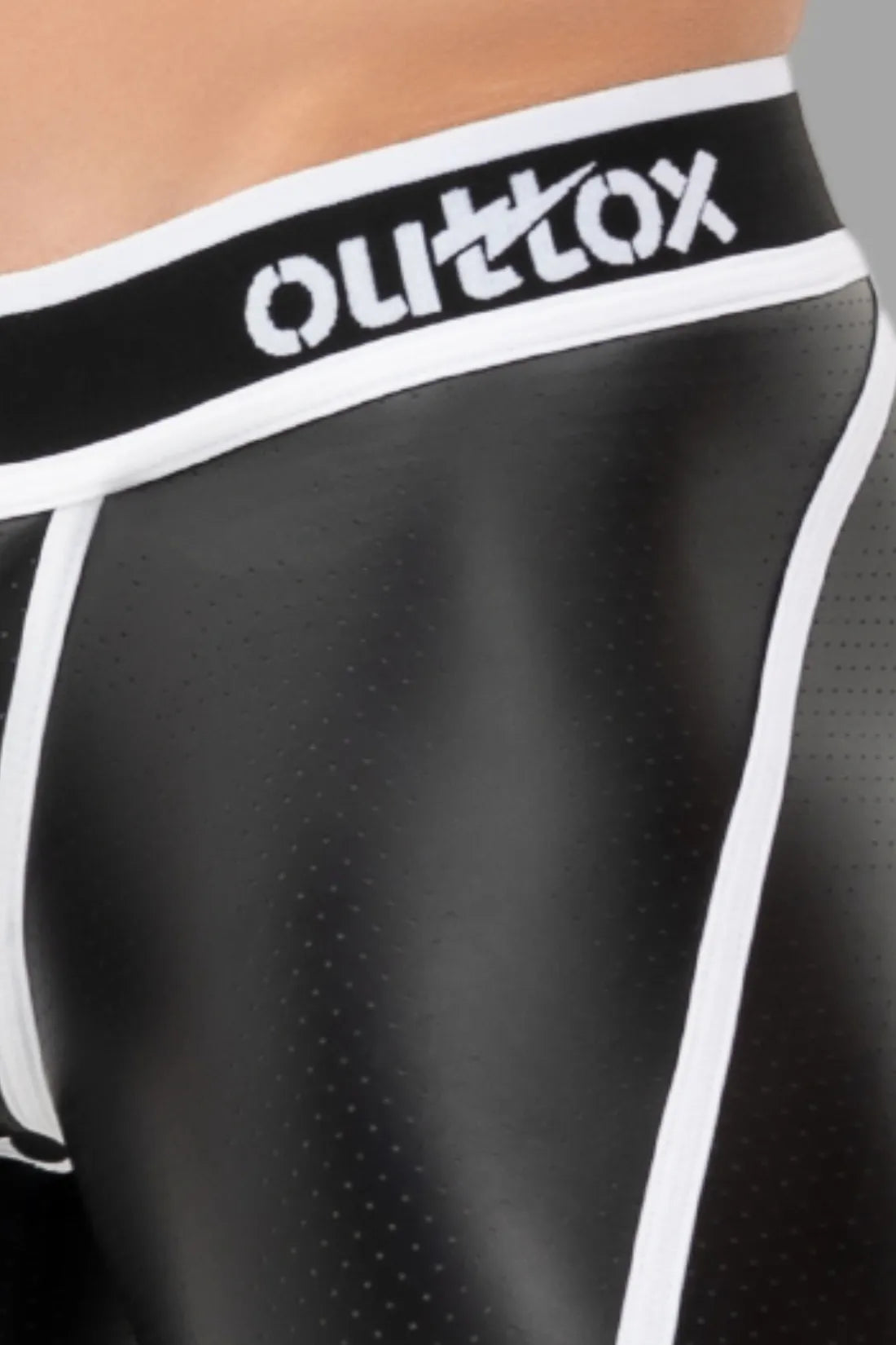 Outtox. Shorts mit offenem Rücken und Druckknopf-Codpiece. Schwarz und Weiß